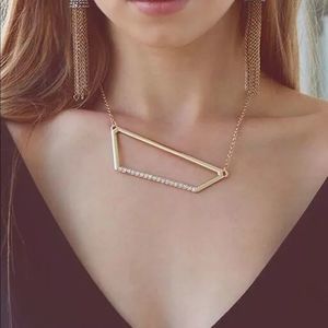 NEW Erica Nikol Gold Tone Asymmetrical Necklace